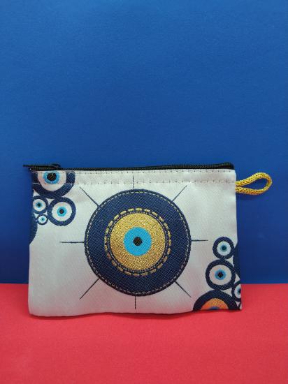 Authentic coin purse with evil eye bead pattern.