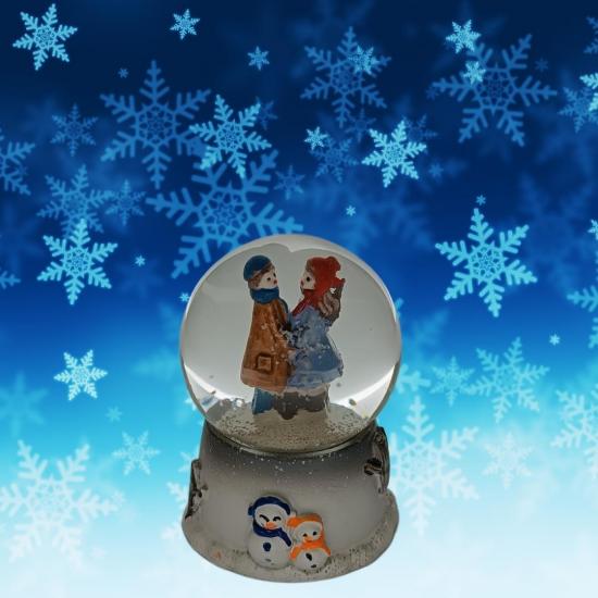 Lover themed illuminated snow globe.